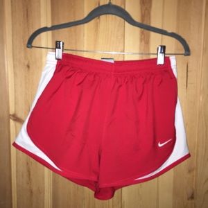 Red Nike DRI-FIT shorts
